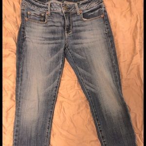 These Womens jeans have a distressed look& are stretchy